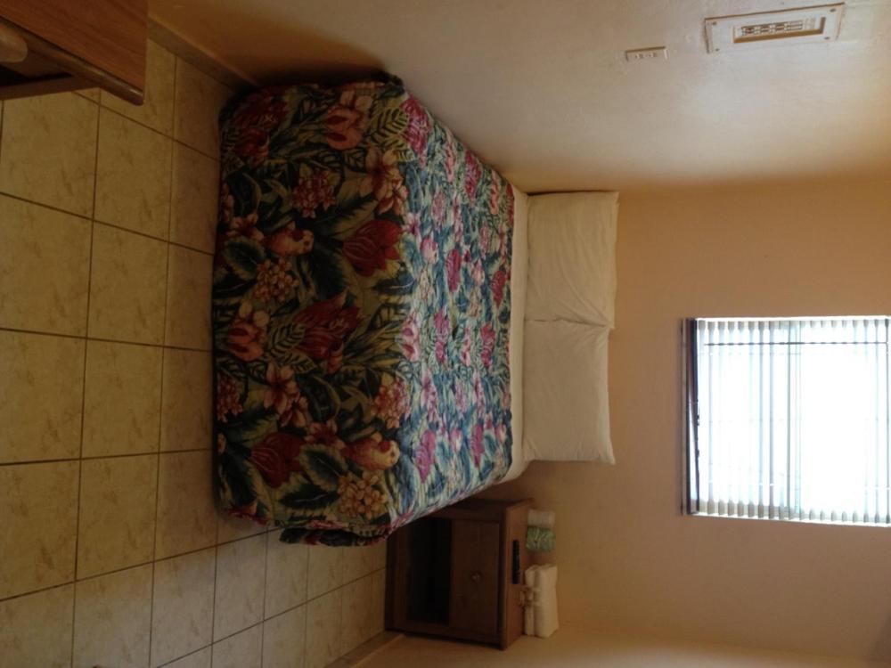 Queen Room with Shared Bathroom